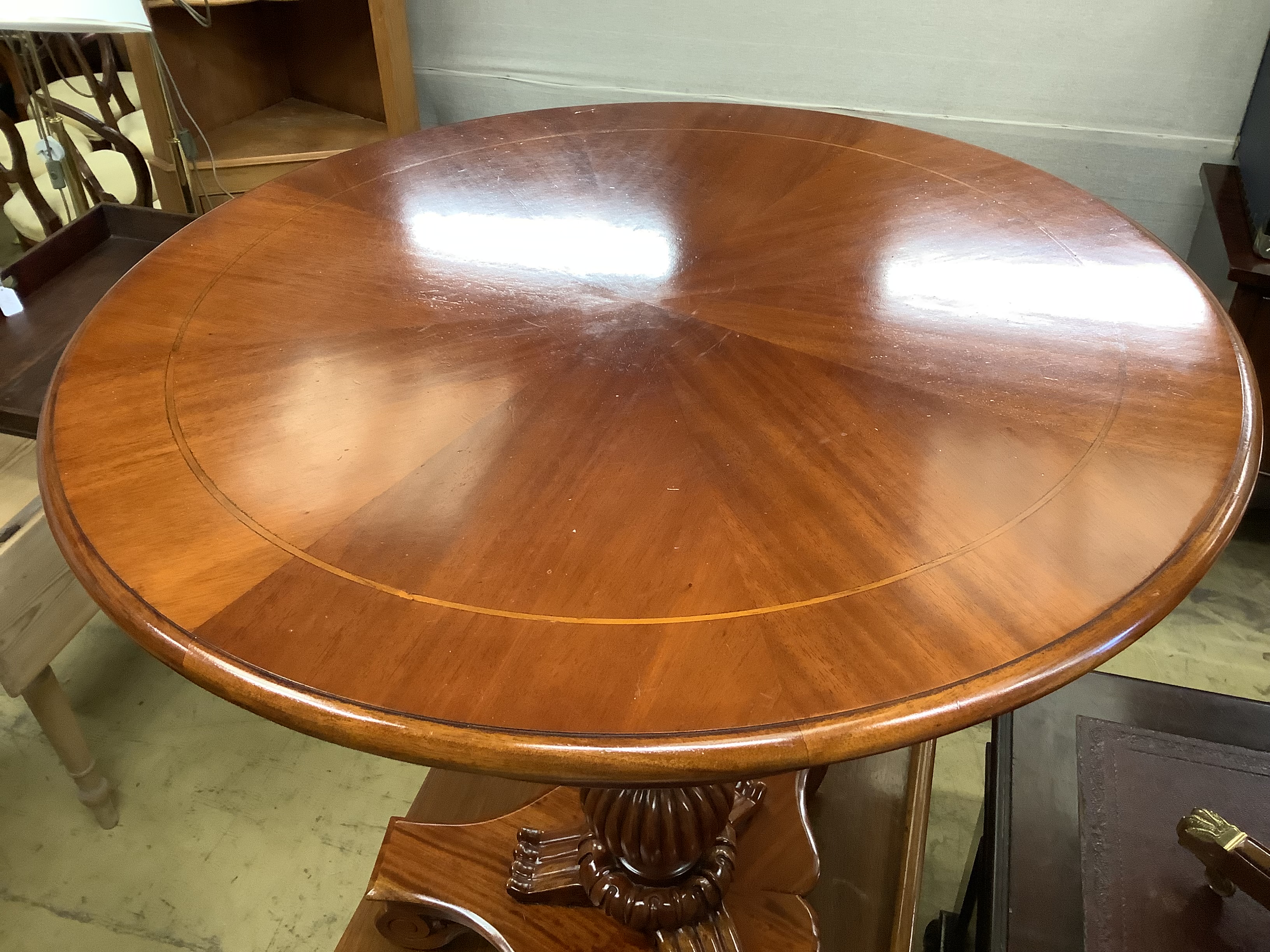 A William IV style mahogany tilt-top centre table